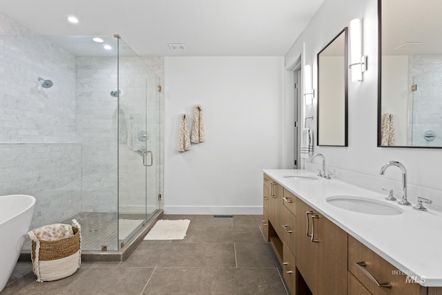 885 E Joplin Ln, Eagle, ID 83616 - bathroom featuring a shower stall, double vanity, a freestanding bath, and recessed lighting