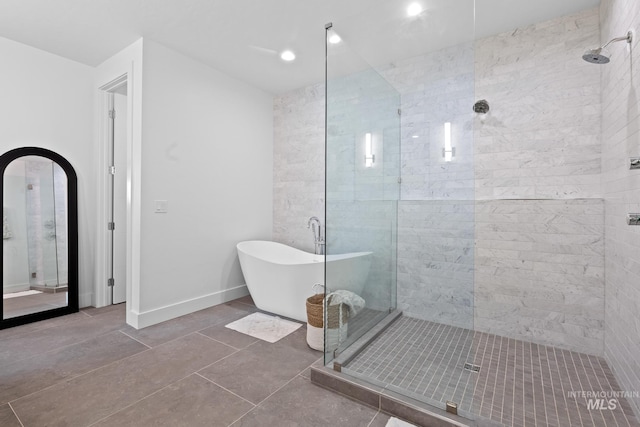 885 E Joplin Ln, Eagle, ID 83616 - bathroom with a shower stall, a soaking tub, tile patterned flooring, and recessed lighting