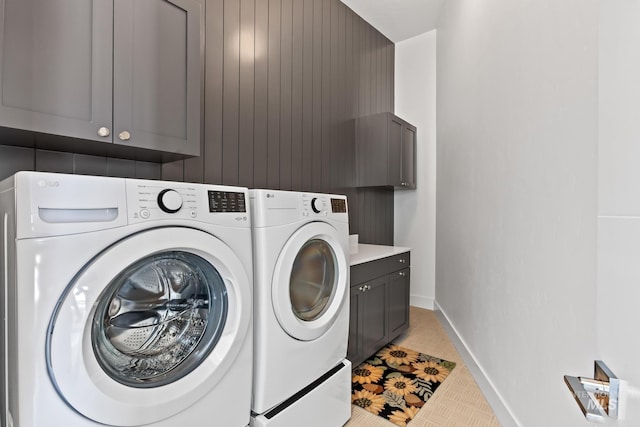 885 E Joplin Ln, Eagle, ID 83616 - laundry area with cabinet space, washer and dryer, and light tile patterned floors
