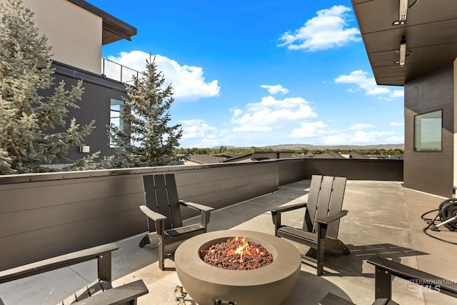 885 E Joplin Ln, Eagle, ID 83616 - view of patio / terrace with an outdoor fire pit