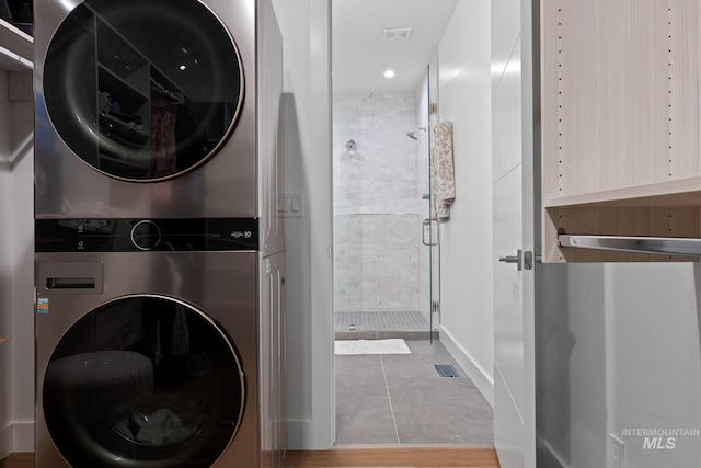 885 E Joplin Ln, Eagle, ID 83616 - washroom with stacked washer / drying machine, tile patterned floors, and recessed lighting