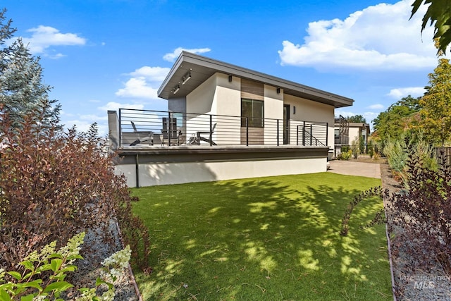 885 E Joplin Ln, Eagle, ID 83616 - back of property with stucco siding and a balcony
