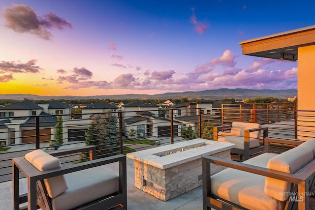 885 E Joplin Ln, Eagle, ID 83616 - balcony with an outdoor fire pit, a residential view, and a mountain view