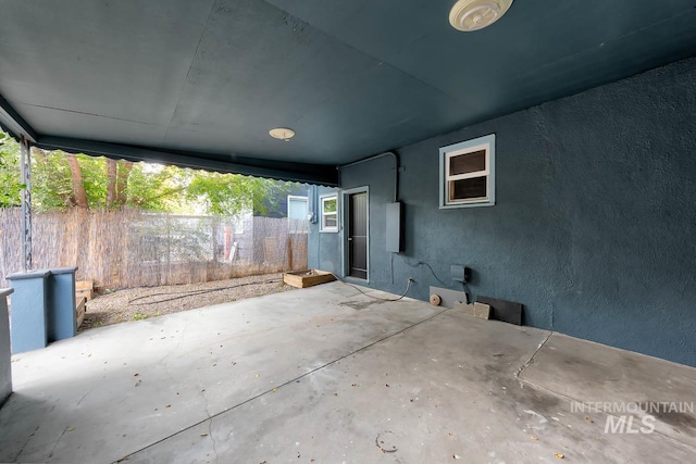 view of patio / terrace featuring fence