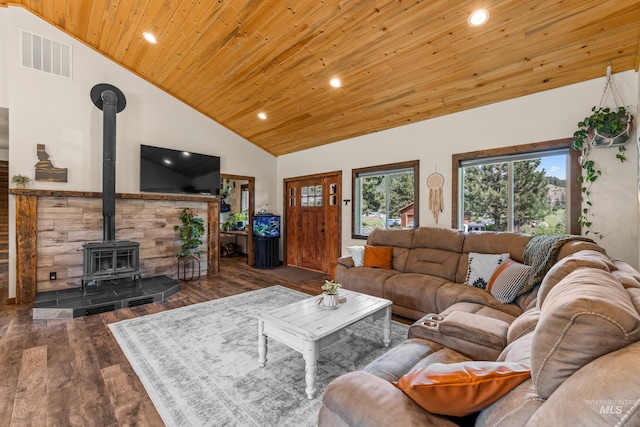 3383 Ridge Dr, Mccall, ID 83638 - living area featuring a wood stove, wood ceiling, recessed lighting, wood finished floors, and high vaulted ceiling
