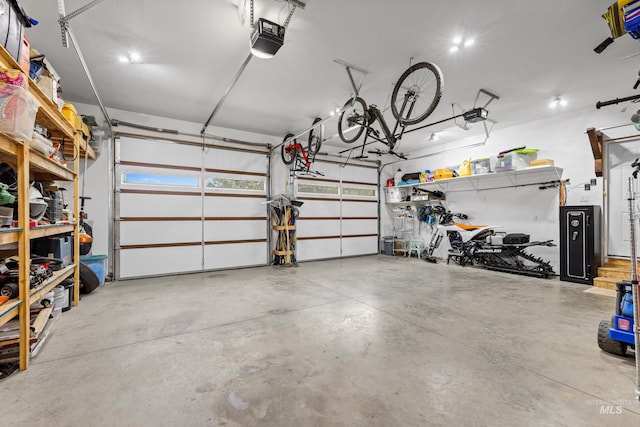 3383 Ridge Dr, Mccall, ID 83638 - garage featuring a garage door opener
