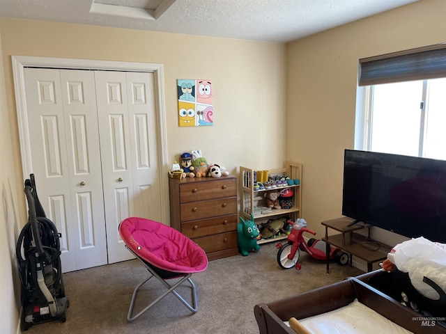 2329 S Garland St, Nampa, ID 83686 - carpeted bedroom with a closet and a textured ceiling