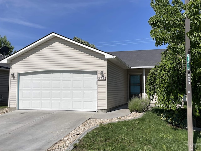 2329 S Garland St, Nampa, ID 83686 - ranch-style home with a garage and concrete driveway