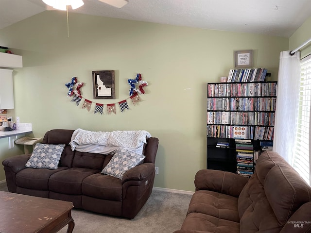 2329 S Garland St, Nampa, ID 83686 - living area featuring vaulted ceiling, carpet flooring, a ceiling fan, and baseboards