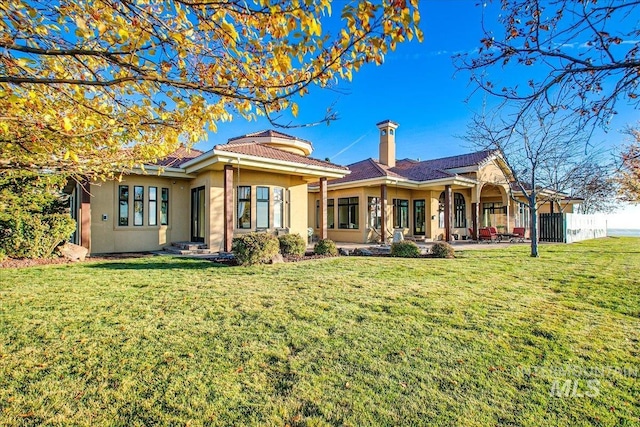 view of front of home with a front yard