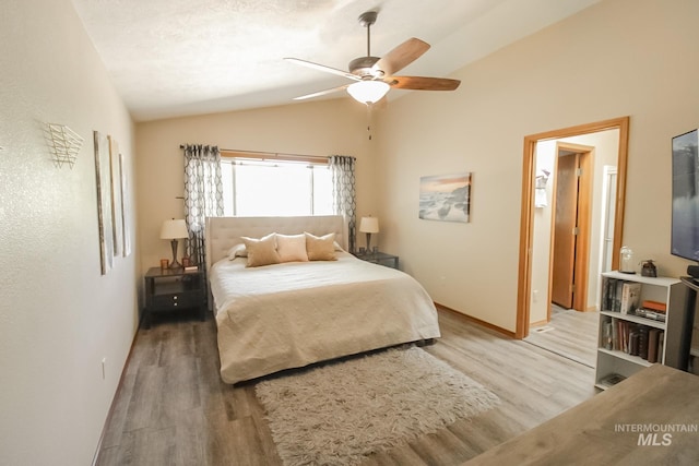 275 E Aruba, Meridian, ID 83642 - bedroom featuring vaulted ceiling, light wood-style floors, baseboards, and ceiling fan
