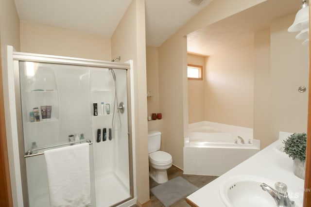 275 E Aruba, Meridian, ID 83642 - bathroom featuring a stall shower, a bath, double vanity, and toilet