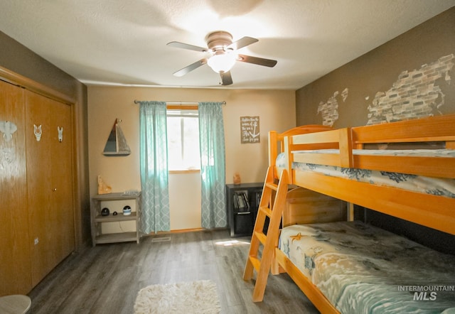 275 E Aruba, Meridian, ID 83642 - bedroom featuring wood finished floors and a ceiling fan