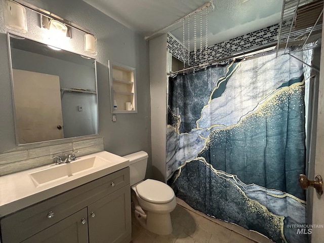 full bath with vanity, toilet, and a shower with curtain