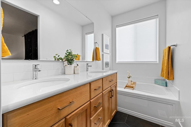 4875 N Glenrock Ave, Meridian, ID 83646 - bathroom featuring double vanity, a bath, tile patterned flooring, and a sink