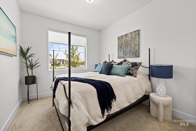 4875 N Glenrock Ave, Meridian, ID 83646 - bedroom featuring light carpet and baseboards