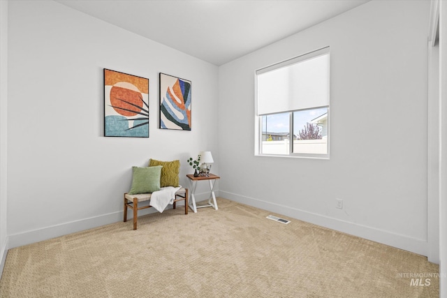 4875 N Glenrock Ave, Meridian, ID 83646 - living area featuring baseboards, visible vents, and carpet flooring