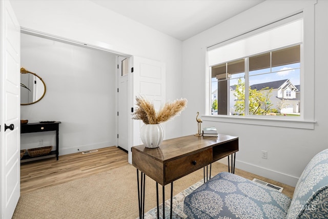 4875 N Glenrock Ave, Meridian, ID 83646 - home office featuring baseboards, visible vents, and light wood finished floors
