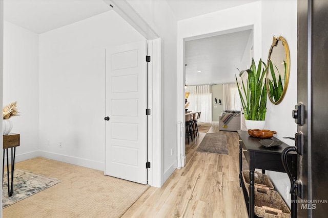4875 N Glenrock Ave, Meridian, ID 83646 - hall with light wood-type flooring and baseboards