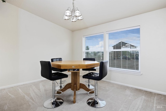 9788 Hwy 78, Hammett, ID 83627 - dining room featuring a chandelier, baseboards, and carpet
