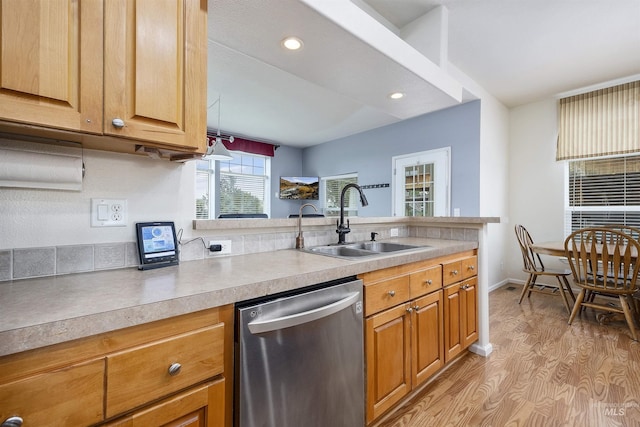 9788 Hwy 78, Hammett, ID 83627 - kitchen with light countertops, dishwasher, a sink, and light wood finished floors