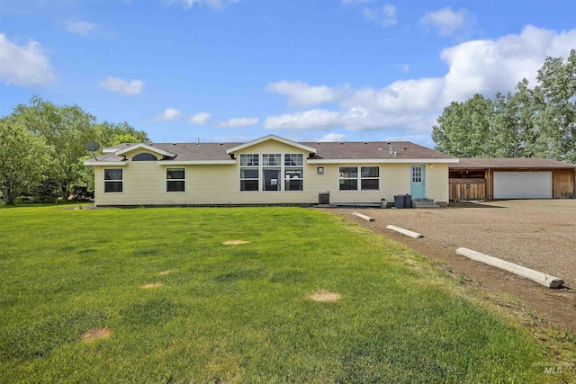 9788 Hwy 78, Hammett, ID 83627 - back of house with a lawn and central air condition unit