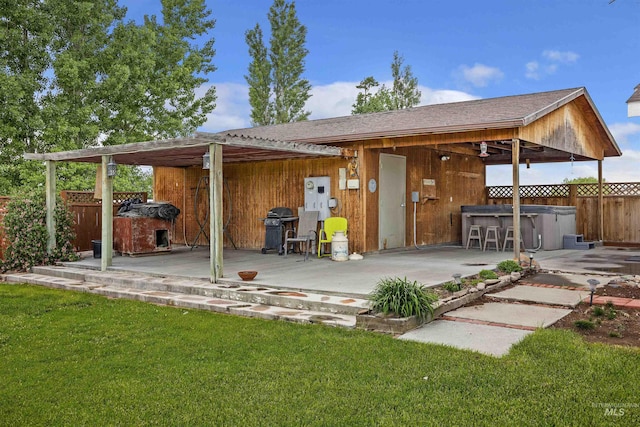 9788 Hwy 78, Hammett, ID 83627 - back of house featuring a patio, outdoor dry bar, fence, and a lawn