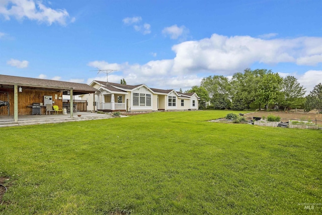 9788 Hwy 78, Hammett, ID 83627 - back of property with a yard, a patio area, and outdoor dry bar