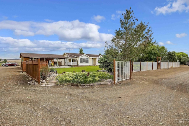 9788 Hwy 78, Hammett, ID 83627 - ranch-style home with a front lawn, fence, and a gate
