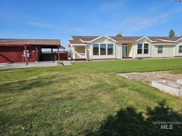 9788 Hwy 78, Hammett, ID 83627 - rear view of house featuring board and batten siding and a lawn