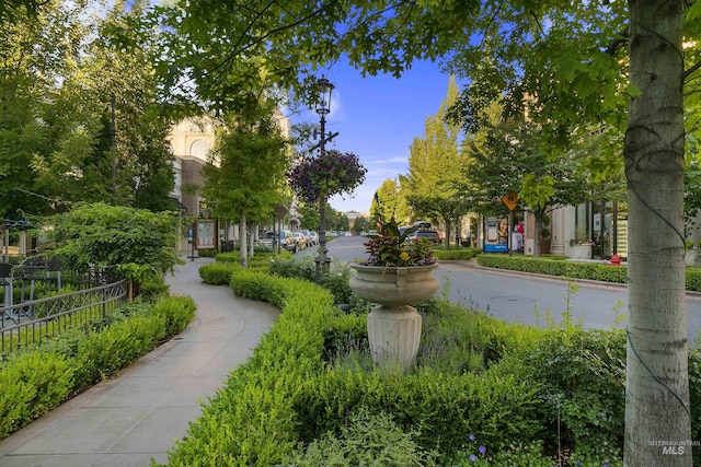 surrounding community featuring fence