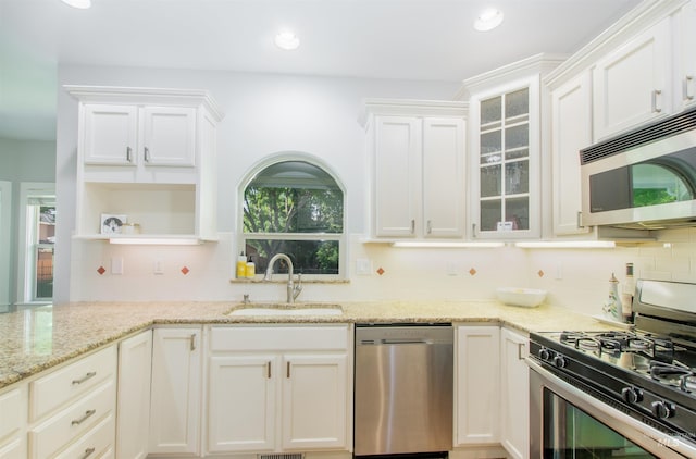 6174 N Queensbury Pl, Boise, ID 83713 - kitchen featuring stainless steel appliances, a sink, open shelves, white cabinetry, and recessed lighting