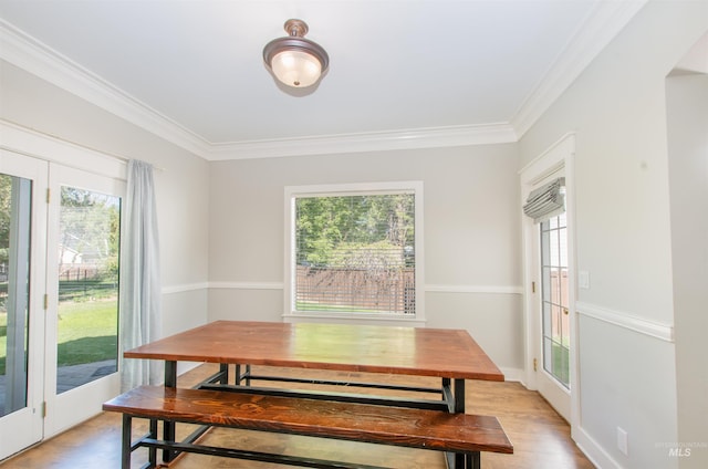 6174 N Queensbury Pl, Boise, ID 83713 - dining room featuring healthy amount of natural light, crown molding, and light wood-style flooring
