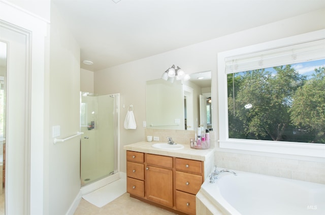 6174 N Queensbury Pl, Boise, ID 83713 - full bath with a shower stall, tile patterned flooring, vanity, and a bath