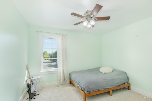 6174 N Queensbury Pl, Boise, ID 83713 - carpeted bedroom featuring baseboards and a ceiling fan