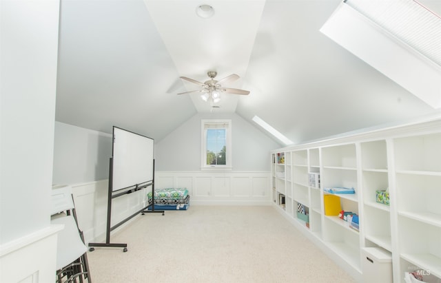 6174 N Queensbury Pl, Boise, ID 83713 - additional living space with a skylight, ceiling fan, carpet, vaulted ceiling, and a wainscoted wall