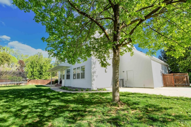 6174 N Queensbury Pl, Boise, ID 83713 - back of house with a trampoline, central air condition unit, and stucco siding