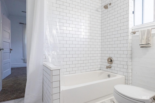 707 9th Ave S, Nampa, ID 83651 - bathroom with toilet and shower / bathtub combination with curtain