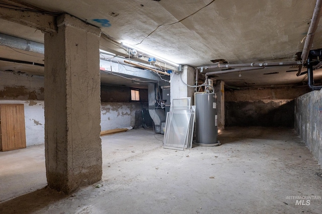 707 9th Ave S, Nampa, ID 83651 - unfinished basement featuring water heater