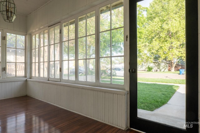 707 9th Ave S, Nampa, ID 83651 - unfurnished sunroom featuring wood-type flooring