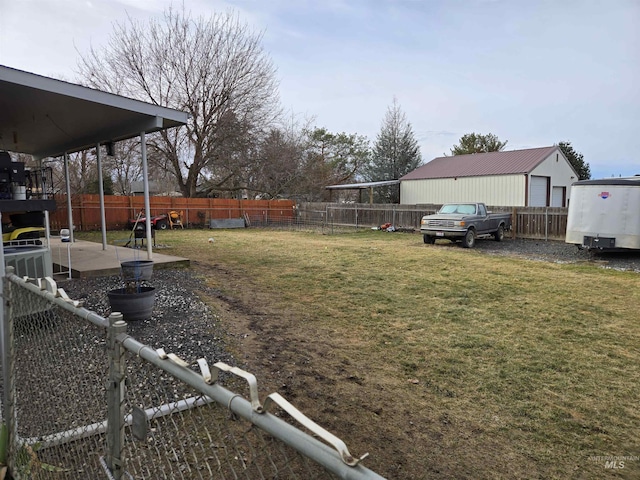 view of yard featuring a patio area and a fenced backyard