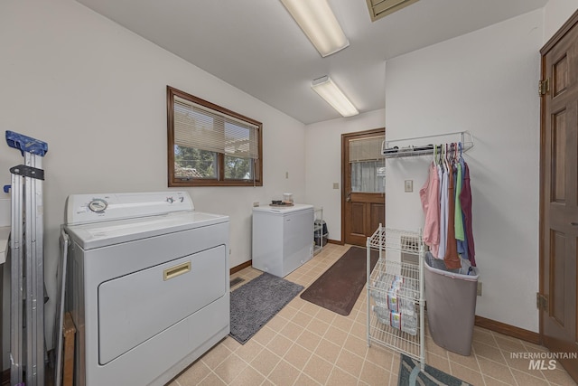 300 N 10th St, Payette, ID 83661 - laundry room featuring washer and dryer and baseboards