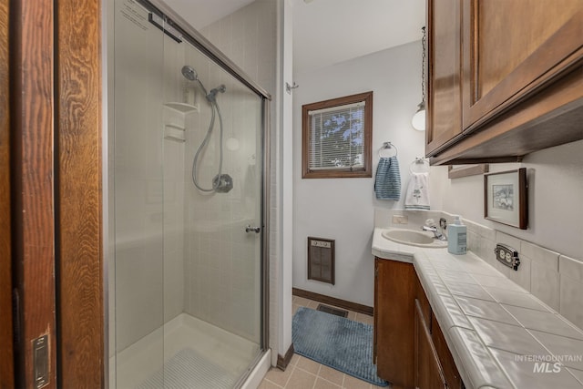 300 N 10th St, Payette, ID 83661 - bathroom featuring vanity, a stall shower, and tile patterned floors