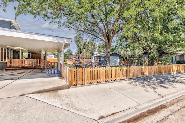 300 N 10th St, Payette, ID 83661 - view of front of property with a fenced front yard and a carport
