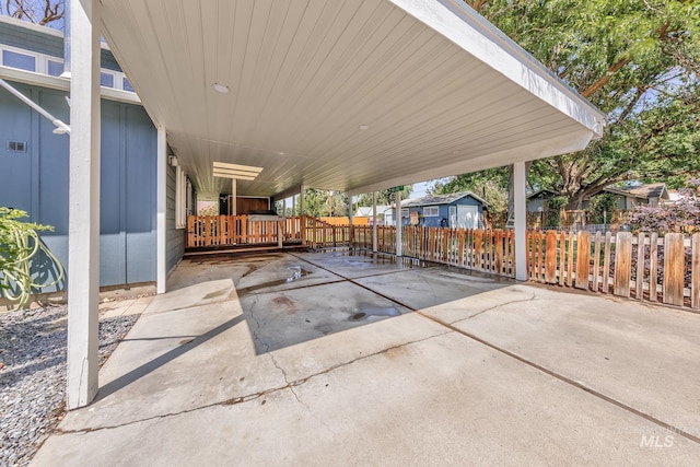 300 N 10th St, Payette, ID 83661 - view of patio with a carport and driveway