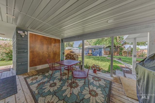 300 N 10th St, Payette, ID 83661 - wooden terrace featuring outdoor dining space and an outdoor structure