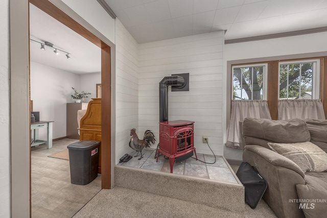300 N 10th St, Payette, ID 83661 - living room featuring a wood stove and track lighting