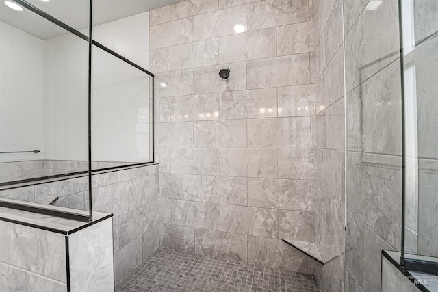 bathroom featuring recessed lighting and walk in shower