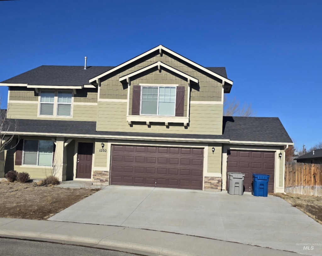 craftsman-style house with a garage