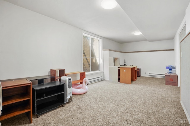 interior space featuring a baseboard heating unit and carpet floors